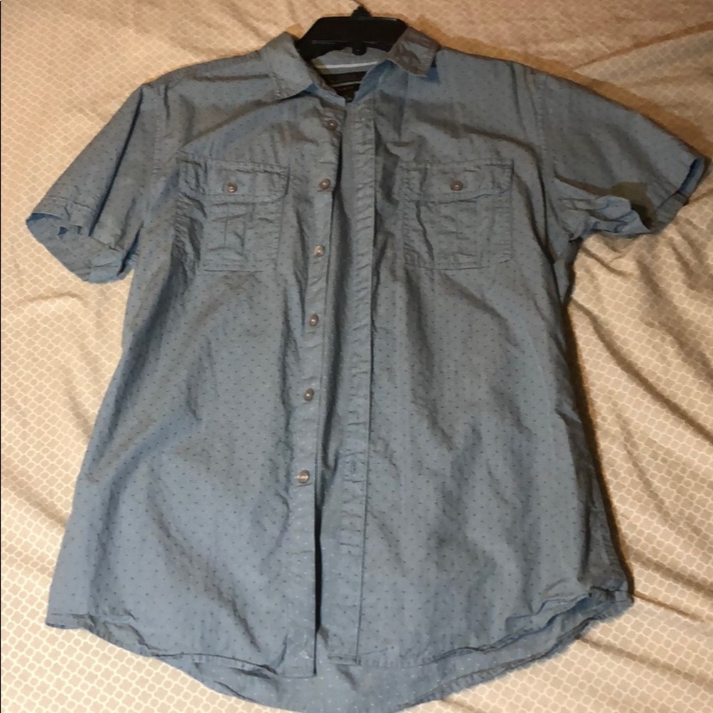 button down blue shortsleeved shirt